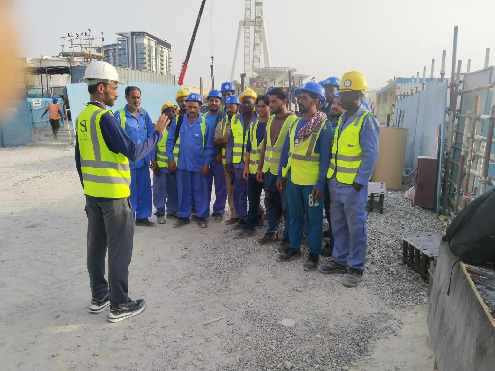 SRJ workforce assembled on a construction site